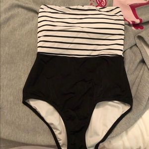 white and black one piece bathing suit